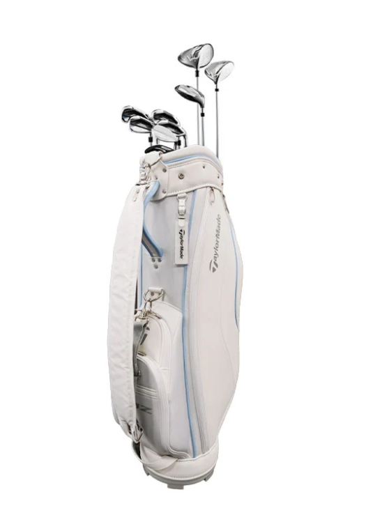 TaylorMade ladies complete golf package set featuring a white and light blue cart bag filled with driver, fairway woods, hybrids, and irons.