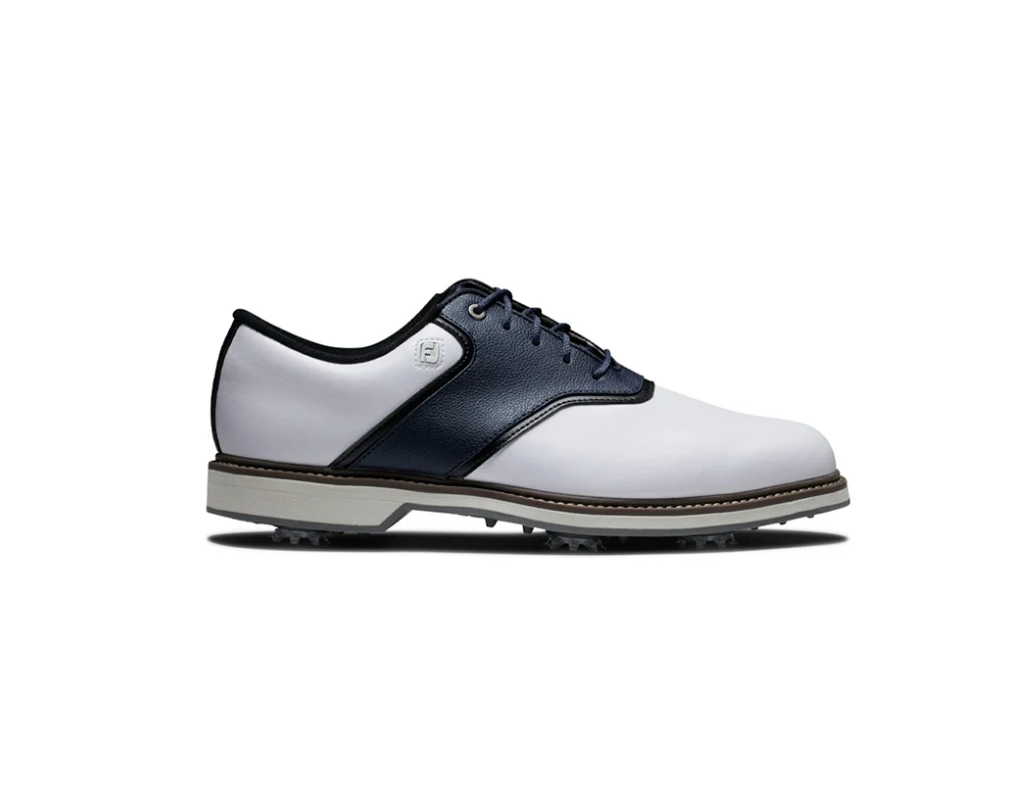 FootJoy men's classic saddle golf shoe in white and navy blue leather with replaceable spikes and FJ heel logo.